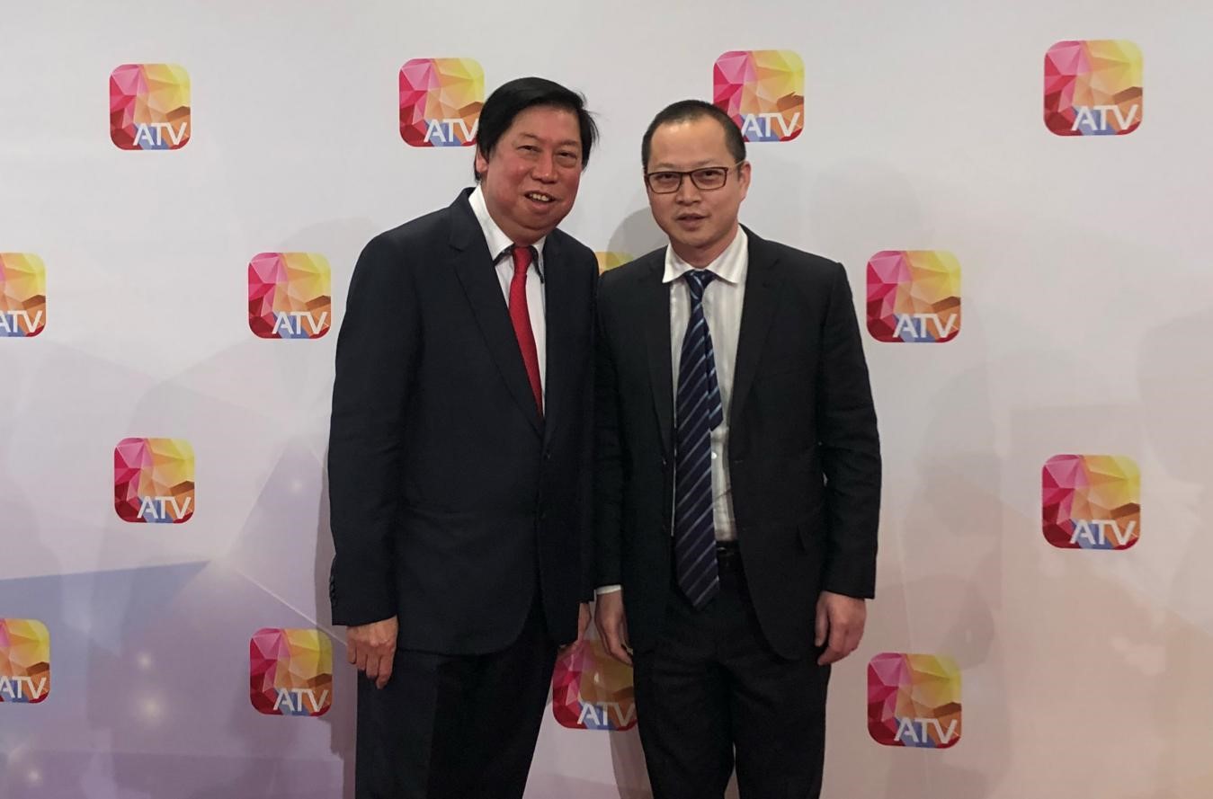 亚视行政总裁吴雨与宝马bm1122线路顶级总裁李波